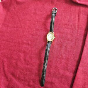 Women's timex watch, black leather band, gold face